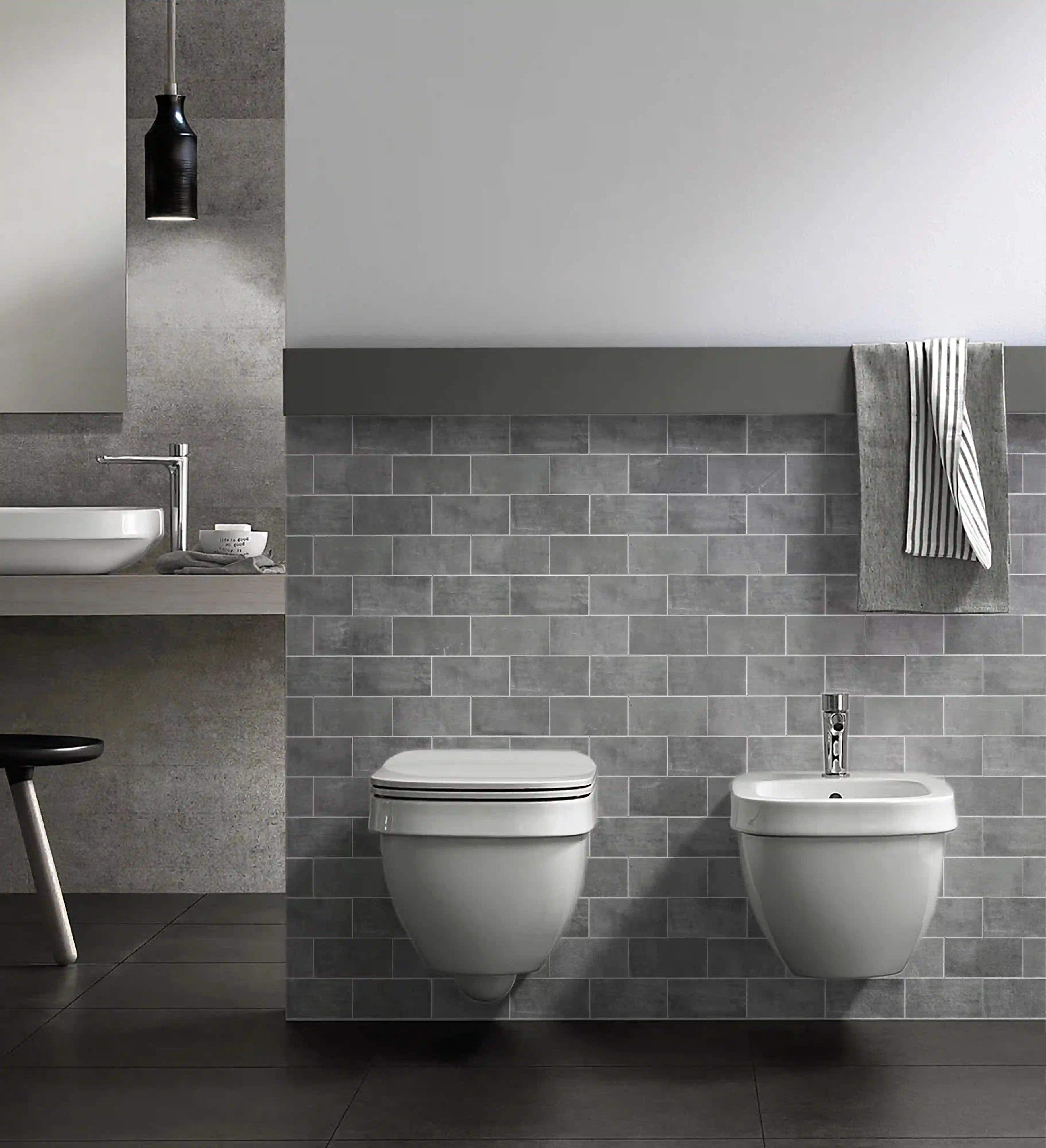 dark-gray-vinyl-concrete-look-peel-and-stick-subway-tiles-in-bathroom