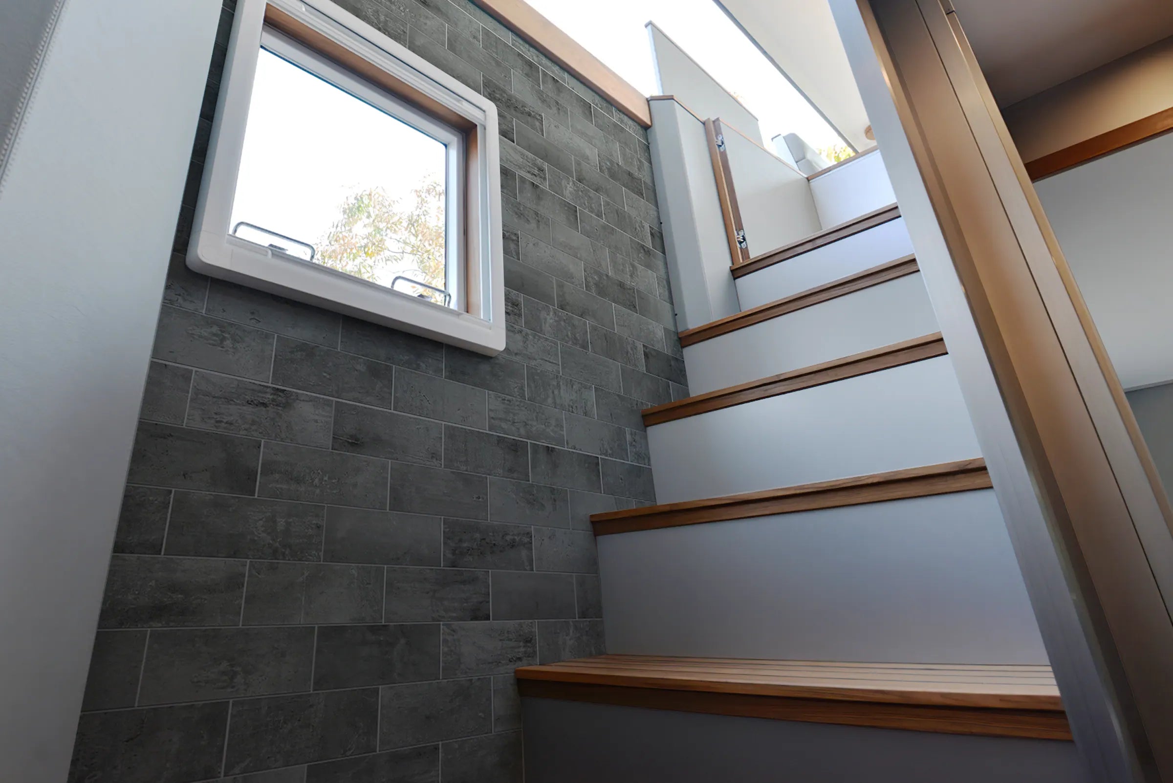 dark-gray-vinyl-concrete-look-peel-and-stick-subway-tiles-in-RV